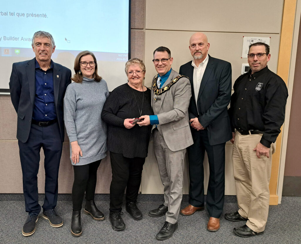 Connie Johnston, a 72-year-old Russell resident, was presented with the Community Builder Award for her dedication to the community. It was presented to her during the last Council meeting on March 11.