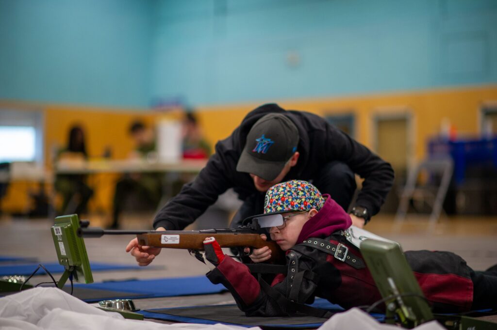 Captain Bossé of the 2804 Royal Canadian Army Cadet Corps in Casselman helps a cadet during the Cadet Regional Marksmanship Competition held from April 12 to 14, in Trenton.