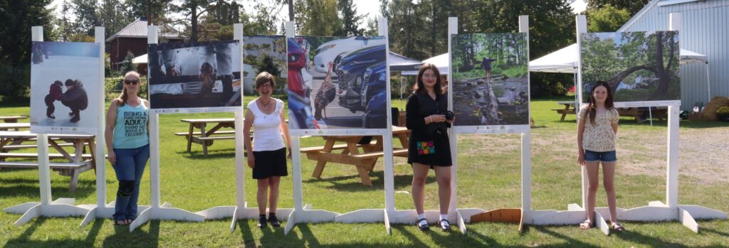 From left to right: “First Skate, Not the Last” by Hannah Mitchell, “Hidden Boots” by Laura Lichty, “Hello There” by Paula Brown, “Balance” by Elizabeth Bahl-Séguin, and “The Bidge” by Amelia Tamas.