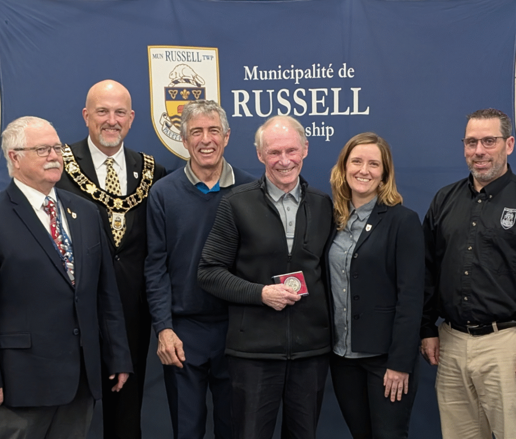 Russell Township honors Dave Dyer with a Citizen Recognition Award for his decades of dedication to local sports, volunteerism, and community-building initiatives.