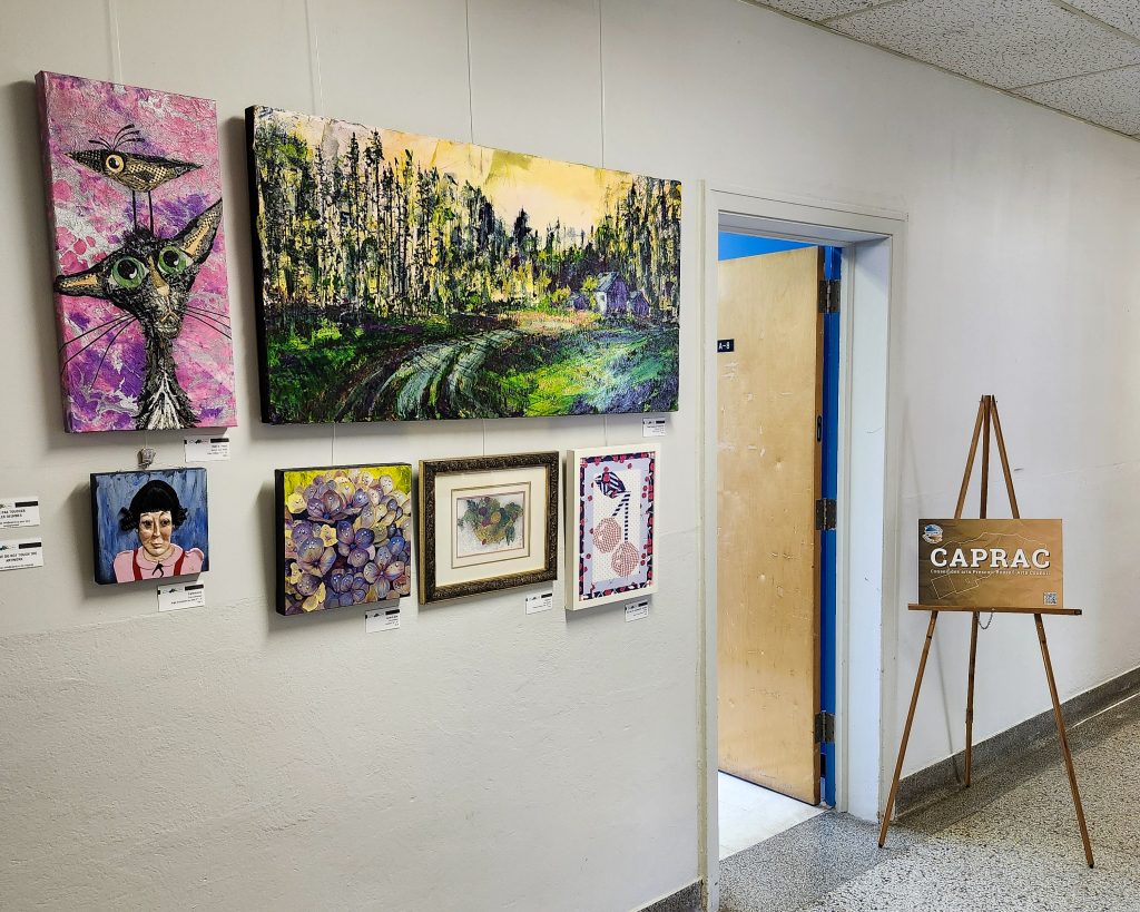 A selection of works by local artists brightens the walls near the CAPRAC office in Casselman, inviting the community to engage with regional creativity as part of the Municipal Mini-Gallery exhibition.