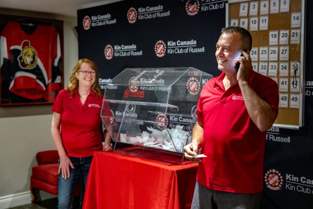 Cindy Anthony (left) and Doug Anthony (right), Chair of Catch the Ace 7, celebrates the success of the Kin Club of Russell’s record-breaking lottery, which has raised over $7.2 million for local charities.