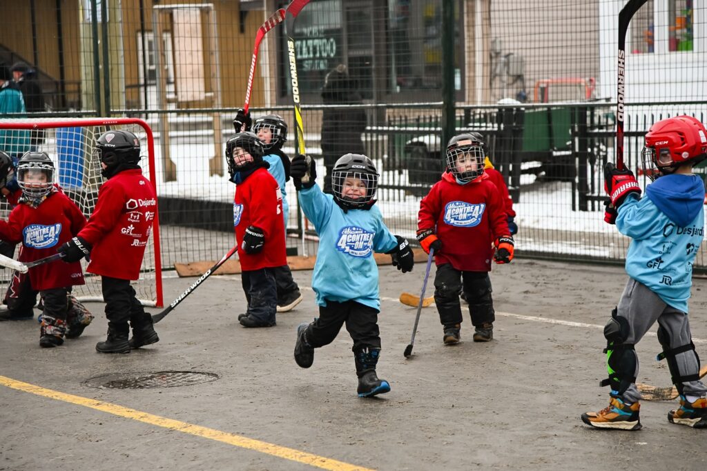 Young participants take to the street for a friendly game of 4-on-4 hockey, one of several family-friendly activities offered during the Casselman Christmas Festival.