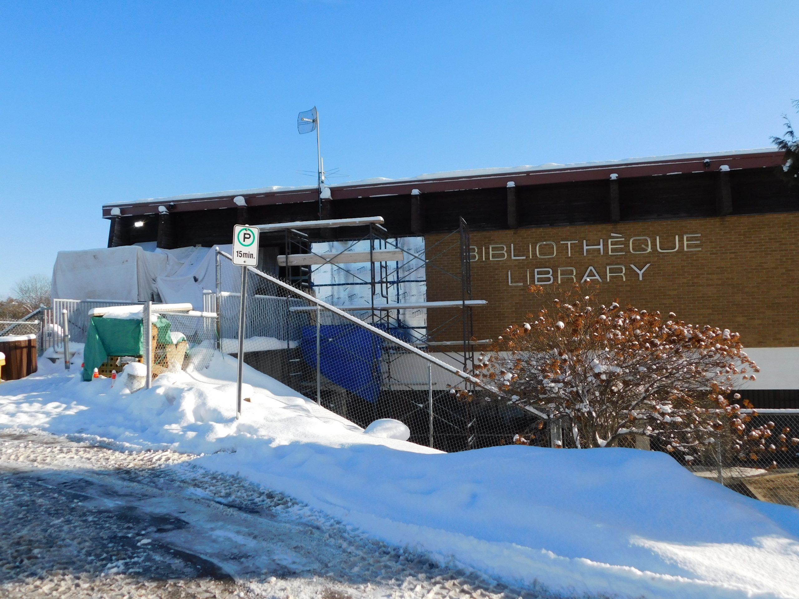 Repair work being done to library's entrance way - Tribune-Express