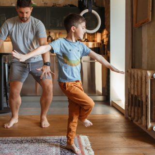 A father with a little son having fun together