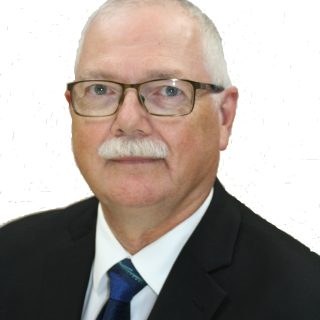 Le conseiller Charles Armstrong compte bien tenir les promesses qu'il a faites lors de sa campagne électorale, mais des défis plus importants ont pris le dessus, comme le nouveau plan de traitement des eaux et « l'urbanisation qui s'impose dans les zones agricoles du canton ».