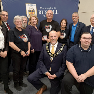 From left to right: (top row) Councillor Lisa Deacon, Councillor Jamie Laurin, Donna Lafrance, Paul Deveau, Melanie Burns, Billy Cashman, Larissa de Quimper, Councillor Marc Lalonde, and Councillor Charles Armstrong. (Bottom row) Mayor Mike Tarnowski, and Travis Laramee.