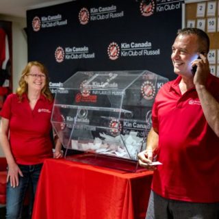 Cindy Anthony (left) and Doug Anthony (right), Chair of Catch the Ace 7, celebrates the success of the Kin Club of Russell’s record-breaking lottery, which has raised over $7.2 million for local charities.