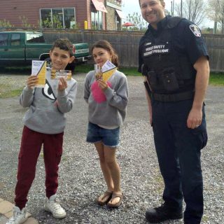 Public Safety and Enforcement officers issued April’s “positive tickets” to Juliana, 9, and Danek, 9, who demonstrated outstanding community spirit during the April 13 and 14 clean up on Forced Road and Craig Street.