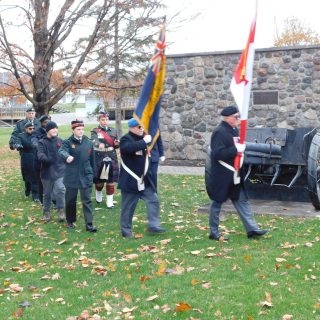 Veterans and cadets march in parade formation at the L’Orignal Park Cenotaph.