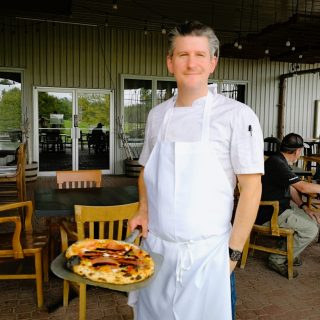Chef Nick Berolo shows off his Neapolitan-style pizza with house-made culetello.