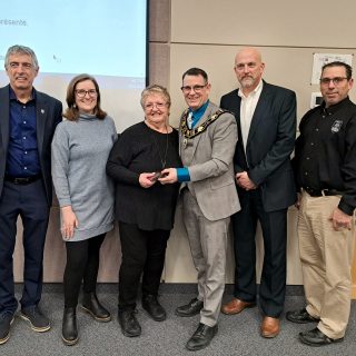 Connie Johnston, a 72-year-old Russell resident, was presented with the Community Builder Award for her dedication to the community. It was presented to her during the last Council meeting on March 11.