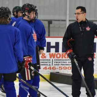 Rockland Nationals head coach Justin Pereira (right) talks with prospects of the Rockland Nationals hockey program during off season training sessions earlier this month.