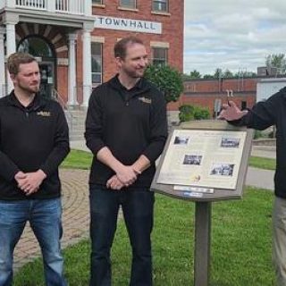 The co-owners of Mobile Escapes Eric Marcotte (left) and Nicholas Marcil (centre) introduce a new, free game that explores the history of Clarence-Rockland called Puzzle Blitz.