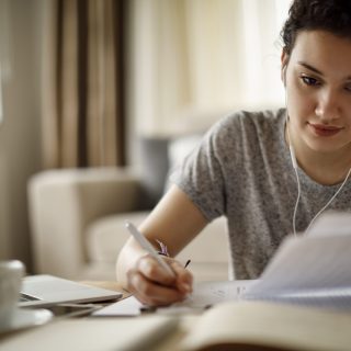 Young woman working at home